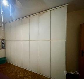 Armadio con comodini settimino e letto