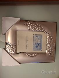 Cornice in argento