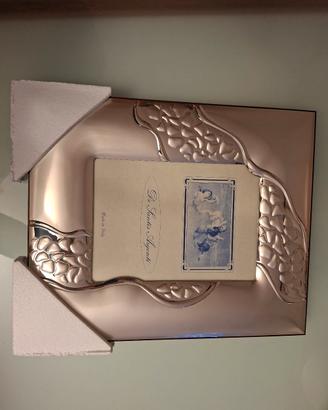 Cornice in argento