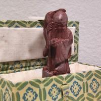 Scultura orientale in pietra rossa anni '60/'80