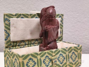 Scultura orientale in pietra rossa anni '60/'80