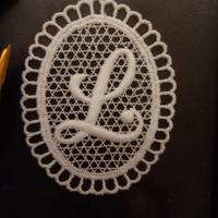 Quadretto con ELLE in merletto veneziano