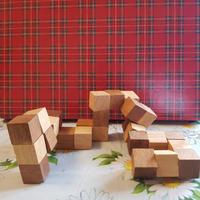 Rompicapo cubo serpente in legno