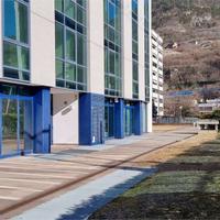 Ufficio al grezzo con posti auto privati.