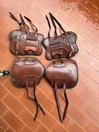 Set stinchiere in cuoio