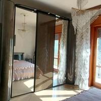 Camera da letto completa in radica di noce