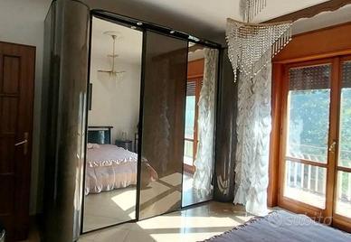 Camera da letto completa in radica di noce