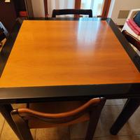 Tavolo a libro in noce e laccato lucido nero