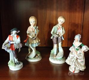 Statuette ceramica n.4 pezzi