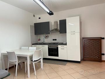 Bilocale con giardino privato