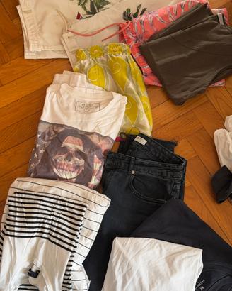 valigia piena di vestiti donna