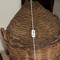 Damigiana in vetro con rivestimento in vimini