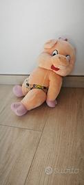 Peluche maialino vintage rosa che prende il sole