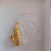 Sassofono in miniatura in plastica