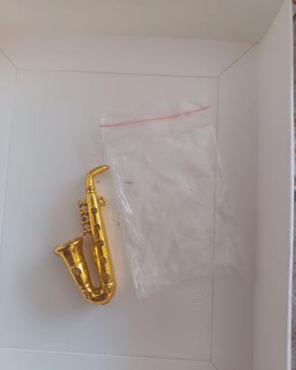 Sassofono in miniatura in plastica
