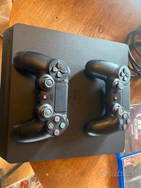 PlayStation 4 (500 GB)+2 joystick+ 5 giochi inclus