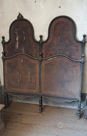 Antico letto in ferro battuto 