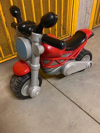 Moto giocattolo a spinta