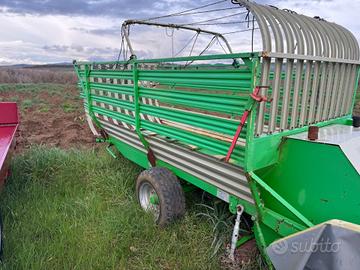 Carro falciautocaricante