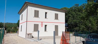 Parte bifamiliare con giardino privato