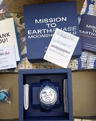 Omega swatch Mission to Earthphase moonshine blu