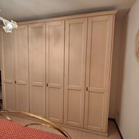 Armadio da camera a 6 ante a battente.