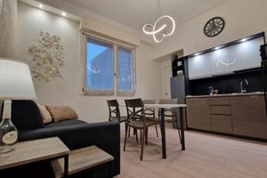 Elegante Bilocale con Garage vicino Fiera