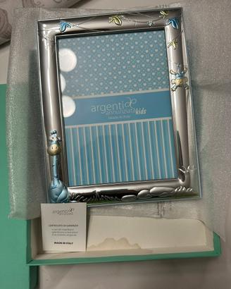 Cornice in argento