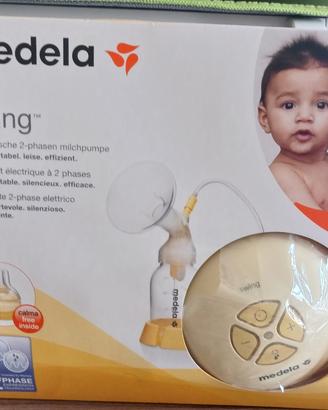 tiralatte medela