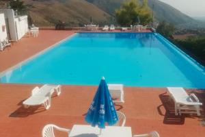Villetta in residence con piscina Villaggio Renda