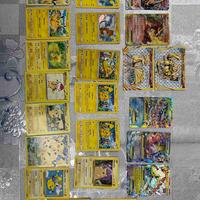 carte Pokemon con vari accessori e altro