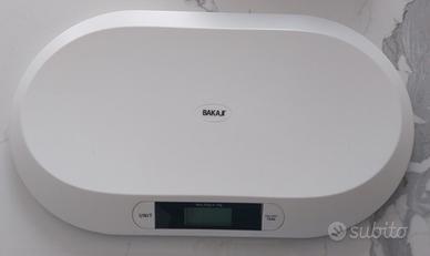 Bilancia pesa neonato e fascia porta bebè