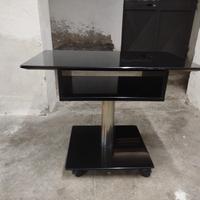 Tavolino porta TV multiuso in legno nero con ruote