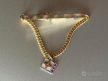 Fermacravatta O.C.Tanner oro 12carati e 3rubini s.