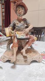 vecchio su seduta Capodimonte 