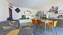 ampio-trilocale-con-giardino-in-contesto-moderno