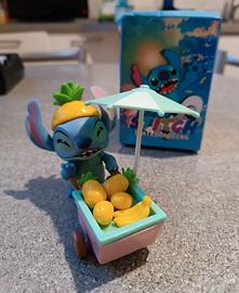 Stitch con carretto frutta
