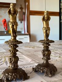 Coppia di candelabri vintage in metallo dorato