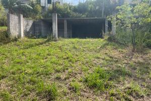 Terreno con fabbricato in costruzione
