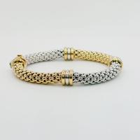 Bracciale oro bianco e giallo 18 kt gr. 34.53 Fope