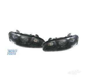 FARI PER OPEL OMEGA 94-99 LENTE A LENTE NERA
