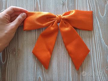 Clip-fiocco per capelli