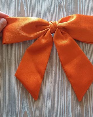 Clip-fiocco per capelli