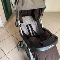 Passeggino compreso di copertura parapioggia