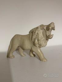 Scultura leone in pietra