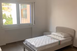 Stanza singola in appartamento nuovo
