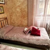 letti artigianali in ferro battuto color oro