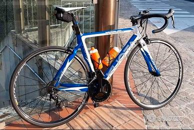 BICI DA CORSA PER PRINCIPIANTI + RULLO ELITE ALENO