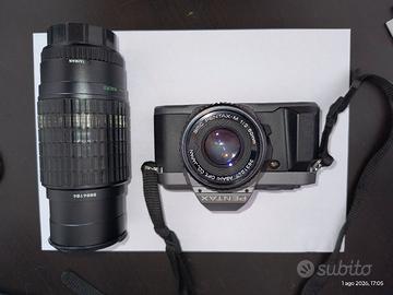 Pentax P30 con teleobiettivo 