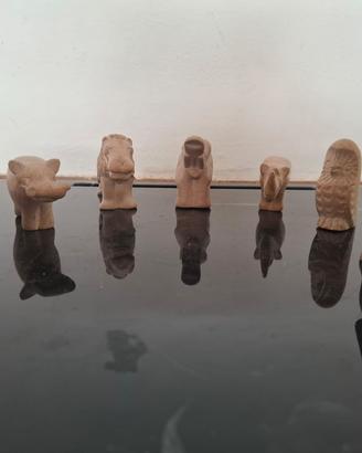 set di 7 animali in pietra ollare. 